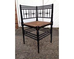 Liberty and Co. An Aesthetic Movement ebonised corner chair and side chair after a design by Ford Maddox Brown. - Thumbnail 2
