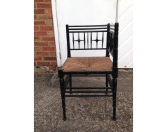 Liberty and Co. An Aesthetic Movement ebonised corner chair and side chair after a design by Ford Maddox Brown. - Thumbnail 4