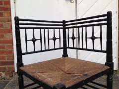Liberty and Co. An Aesthetic Movement ebonised corner chair and side chair after a design by Ford Maddox Brown. - Thumbnail 6