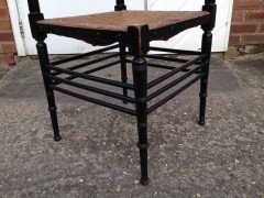 Liberty and Co. An Aesthetic Movement ebonised corner chair and side chair after a design by Ford Maddox Brown. - Thumbnail 7