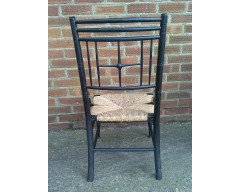 Liberty and Co. An Aesthetic Movement ebonised corner chair and side chair after a design by Ford Maddox Brown. - Thumbnail 10