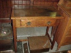A small oak Arts and Crafts Single Drawer desk. - Thumbnail 1