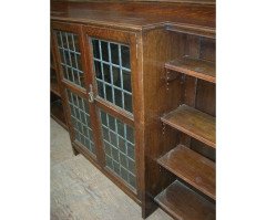 Liberty and Co. A quality Arts and Crafts oak breakfront cascading waterfall bookcase  - Thumbnail 3