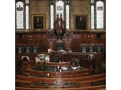 The Middlesex Guildhall and Tony Geering with the original clock he saved and returned to The Guildhall - Thumbnail 2