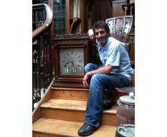 The Middlesex Guildhall and Tony Geering with the original clock he saved and returned to The Guildhall - Thumbnail 4