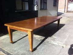 A good quality twelve seater Arts and Crafts extending oak dining table with two extra leaves. - Thumbnail 2
