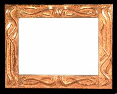 An Arts and Crafts hammered copper rectangular wall mirror - Thumbnail 1