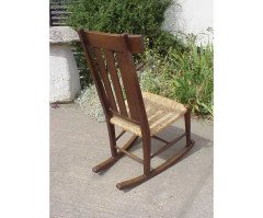 An Arts and Crafts oak rocking chair - Thumbnail 2