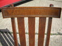 An Arts and Crafts oak rocking chair - Thumbnail 5
