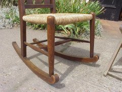An Arts and Crafts oak rocking chair - Thumbnail 8