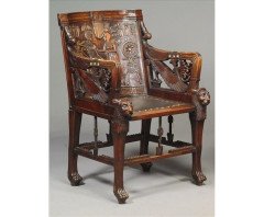 An early Egyptian Revival carved walnut elbow chair - Thumbnail 1