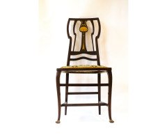 Liberty and Co. An Arts Crafts inlaid mahogany side chair. - Thumbnail 1