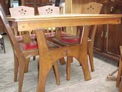 A French Arts and Crafts oak extending dining table - Thumbnail 10
