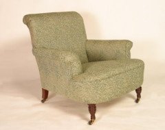 E W Godwin for Collinson and Lock. A low easy armchair - Thumbnail 1