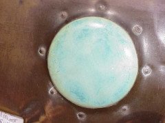 A large Arts and Crafts copper mirror with six large Ruskin roundel's. - Thumbnail 2