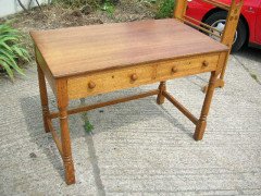 Heals of London. An oak Arts and Crafts Cotswold style two drawer desk - Thumbnail 2