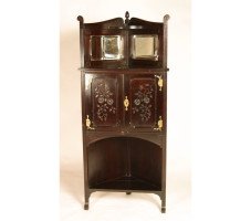 An ebonised Aesthetic corner cabinet - Thumbnail 1