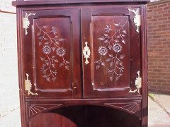 An ebonised Aesthetic corner cabinet - Thumbnail 6