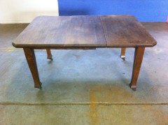 An Arts & Crafts 1/4 Sawn Oak Six Seater Extending Dining Table