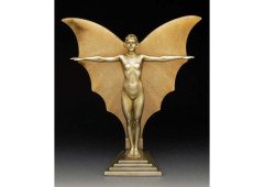 A cold patinated spelter Art Deco table lamp depicting a nude maiden with Alabaster wings and outstretched arms. - Thumbnail 1