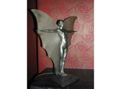 A cold patinated spelter Art Deco table lamp depicting a nude maiden with Alabaster wings and outstretched arms. - Thumbnail 2