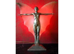 A cold patinated spelter Art Deco table lamp depicting a nude maiden with Alabaster wings and outstretched arms. - Thumbnail 4