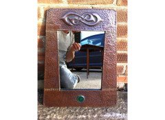 Liberty and Co. A Glasgow Style Arts and Crafts copper mirror - Thumbnail 1