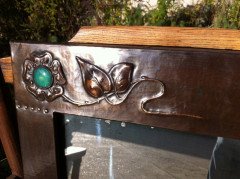 Liberty and Co. An Arts and Crafts mirror by Liberty and Co. - Thumbnail 2