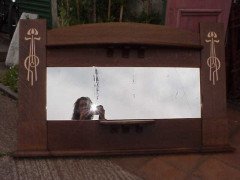 Liberty and Co (attributed). A large Arts and Crafts oak overmantle/mirror - Thumbnail 1