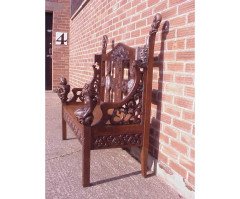 A Celtic Arts and Crafts carved oak settle with carved dragons to the tops - Thumbnail 4