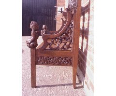 A Celtic Arts and Crafts carved oak settle with carved dragons to the tops - Thumbnail 5