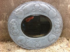 An Arts and Crafts pewter mirror with decorative heart and abstract line details - Thumbnail 1