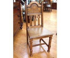 Shapland and Petter. An Arts and Crafts oak chair with arched top and wonderful Peacock inlays - Thumbnail 2