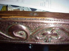 John Pearson. An Arts and Crafts copper mirror with typical hand repousse stylised floral details. - Thumbnail 3