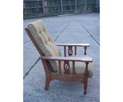 Jas Shoolbred and Co. An oak Arts and Crafts reclining armchair - Thumbnail 1