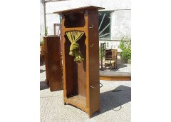 An Arts and Crafts oak hall robe with flaring cornice and twizzling coat hooks to each side - Thumbnail 2