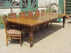 A Gothic revival oak extending dining table with three extra leaves - Thumbnail 2