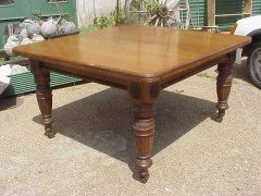 A Gothic revival oak extending dining table with three extra leaves - Thumbnail 3