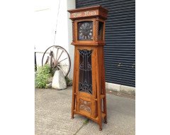 E A Taylor. A rare Arts and Crafts Glasgow school oak grandfather clock with inlaid pewter motto to the top 'TIME FLIES'. - Thumbnail 3