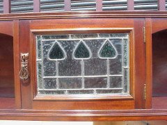 E A Taylor for Wylie and Lochhead. An Arts and Crafts display/sideboard with green glass Voysey style tree details - Thumbnail 4