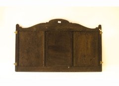 Arthur Simpson. An Arts Crafts mirror with shaped top, the central bevelled mirror, flanked by stylised carved floral details. - Thumbnail 2