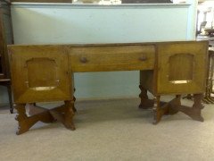 Romney Green. An Arts and Crafts oak sideboard - Thumbnail 1