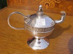 A E Jones. An oil lamp and lighting stick with inscription running round - Thumbnail 1