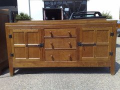 Peter Rabbitman Heap. An oak sideboard. - Thumbnail 1