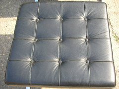 Mies Van Der Rhoe. A pair of black leather and Chrome Barcelona chairs with matching Ottomans/stools - Thumbnail 7