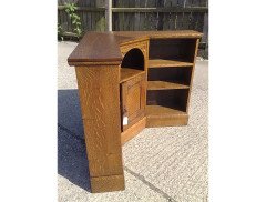 Liberty and Co. An Arts and Crafts oak corner bookcase - Thumbnail 3