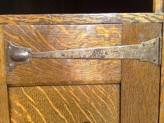 Liberty and Co. An Arts and Crafts oak corner bookcase - Thumbnail 6