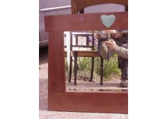An Arts and Crafts mahogany style mirror with subtle angular form with a light blue Ruskin Heart to the top - Thumbnail 2