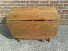 Liberty and Co. A good quality large Arts and Crafts oak drop leaf dining - Thumbnail 6