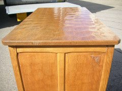 A wondefull quality oak chest of drawers with Adze detailing throughout - Thumbnail 2